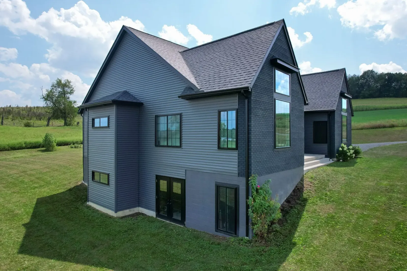 Coal black casement and slider replacement windows with internal grids